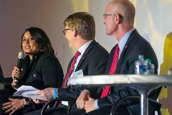 Atlanta City Councilwoman committee, Marci Overstreet moderates a panel about transportation in South Metro Atlanta last year. Overstreet represents a large segment of the  Cascade Heights neighborhood and promotes infrastructure improvement efforts to create sidewalks and better streets in southwest Atlanta, including the years-long Cascade complete streets initiative to fund the road’s repair  (ALYSSA POINTER / AJC file photo)