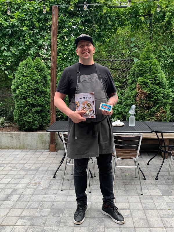 Atlanta native Chris McDade is the chef and co-owner of Popina in Brooklyn, New York, and the author of the newly released cookbook "The Magic of Tinned Fish" (Artisan Books, $24.95). (Courtesy of Samantha Lewis)