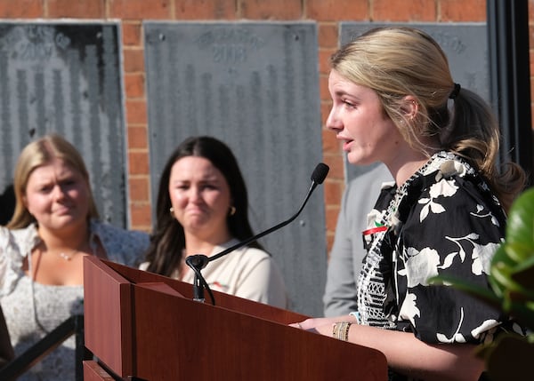 Alpha Chi Omega President Chloe Mullis addresses the large crowd at the vigil at the University of Georgia's Tate Plaza on Monday, Feb. 26, 2024, and shares what a treasure Laken Riley was to the sorority. Riley was killed last week in Athens. (Nell Carroll for The Atlanta Journal-Constitution)