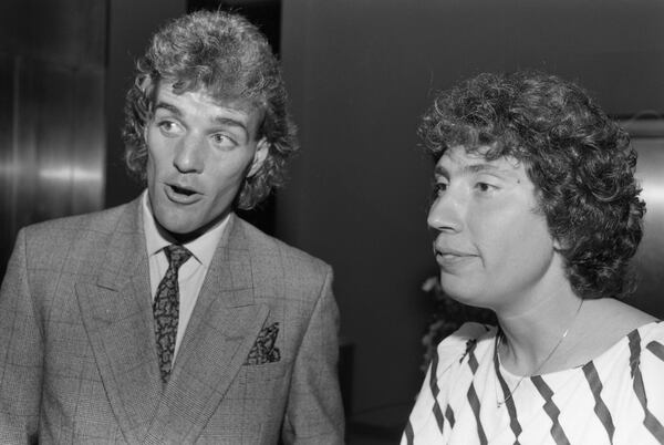 Michael Hardwick, defendant in the Georgia sodomy case Bowers v. Hardwick, with his lawyer Kathy Wilde at Colony Square in Atlanta, Ga. in September 1986. WILLIAM BERRY / THE ATLANTA JOURNAL-CONSTITUTION