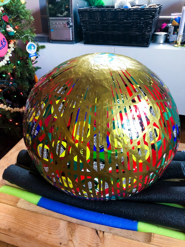 Photos: How to build the world's biggest (maybe) sticker ball