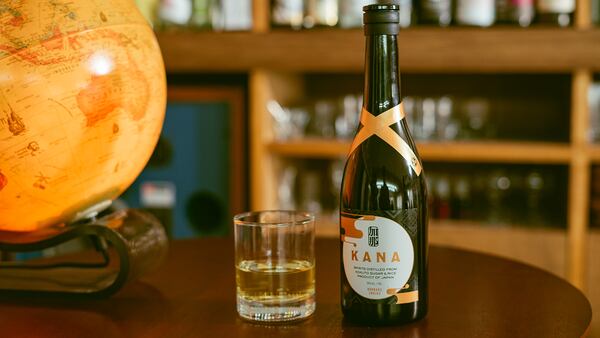 Kana shochu uses barrel-aged kokuto sugar in the fermentation process. Courtesy of Honkaku Spirits