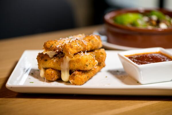  Smoked Mozzarella Sticks with fresh mozzarella, Italian bread crumbs, and spicy marinara. Photo credit- Mia Yakel.