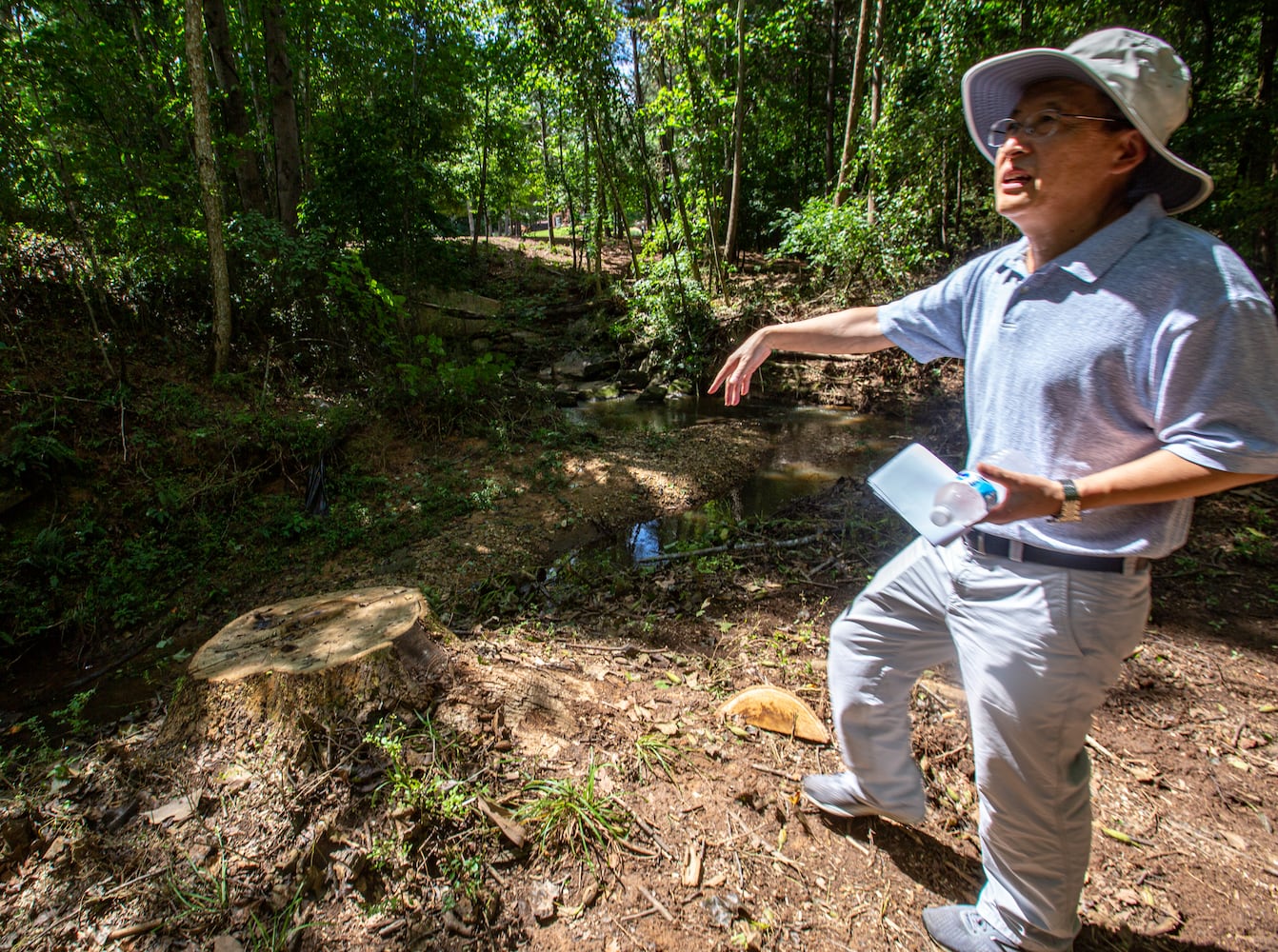 Medlock Bridge in Johns Creek errosion, run off and neglect since the city’s formation has prompted a utility fee to begin to address the problem.