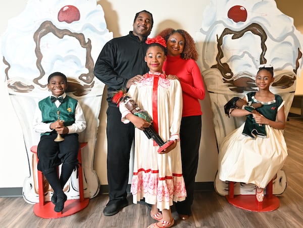 December 4, 2020 Alpharetta - Portrait of Nena Gilreath and her husband Waverly Lucas, both co-founders of Ballethnic Dance Company, with young dancers (from left) Braylin Welander, 8, Journee Hall-Cooley, 11, and Morgan Grier, 10, at The Legacy Theater At Phase Family Center in Alpharetta on Friday, December 4, 2020. (Hyosub Shin / Hyosub.Shin@ajc.com)