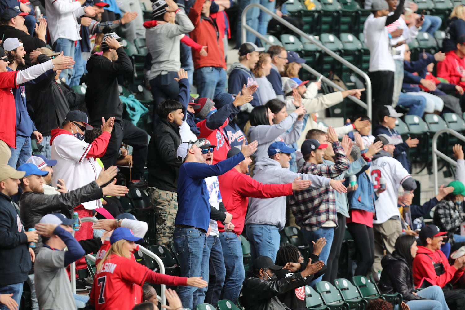 Atlanta Braves fans received the 2021 World Series Champions with the tomahawk chop at Truist Stadium on Friday, November 5, 2021. Miguel Martinez for The Atlanta Journal-Constitution