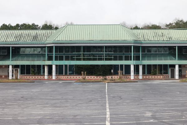 The closed grocery store, Ingles, is shown at the Lake City Crossing shopping center on Jonesboro Rd., Thursday, Feb. 23, 2023, in Morrow, Ga.. No work has been done on this site to build an amphitheater and 27-story condo building by summer 2023. Jason Getz / Jason.Getz@ajc.com)
