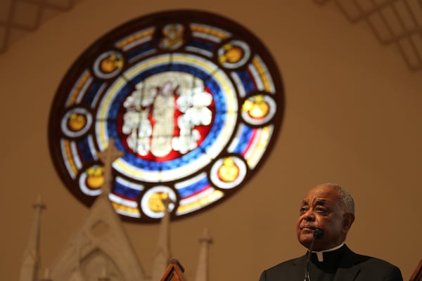 March 25, 2016 Atlanta - Archbishop Wilton D. Gregory gives the opening reflection for the 36th Annual Good Friday Pilgrimage at the Shrine of the Immaculate Conception Catholic Church. Attendants commemorated the stations of the cross along the pilgrimage and reflected on issues at every station. TAYLOR CARPENTER / TAYLOR.CARPENTER@AJC.COM