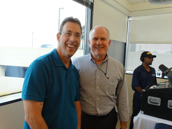 WSB vets Scott Slade (right), who came up with the whole Care-a-thon idea, and Clark Howard get to hang out. They co-hosted the final hour of the two-day careathon. CREDIT: Rodney Ho/rho@ajc.com