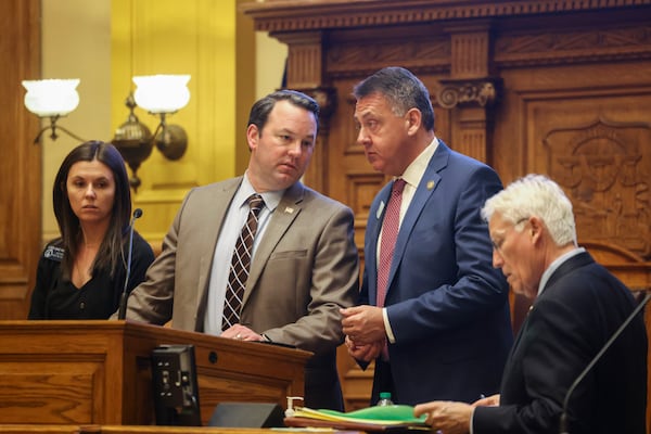 Lt. Gov. Burt Jones talks with Sen. Majority Leader Steve Gooch, R-Dahlonega, during a session in March 2023. (Jason Getz/AJC)
