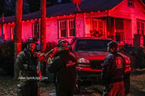 Firefighters responded to a burning home Thursday morning in northwest Atlanta.