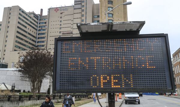 An electronic sign directs motorists to the emergency room at Grady Memorial Hospital on Monday. JOHN SPINK/JSPINK@AJC.COM