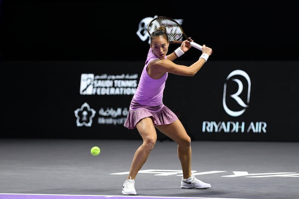 China's Qinwen Zheng shoots the ball during her women's singles semi final match against Czech Republic's Barbora Krejcikova at King Saud University Indoor Arena, in Riyadh, Saudi Arabia, Friday, Nov. 8, 2024. (AP Photo)