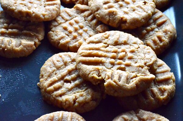 The third ingredient in Three-Ingredient Peanut Butter Cookies can be an egg, or aquafaba (the liquid with canned chickpeas) if you want a vegan version. Virginia Willis for The AJC