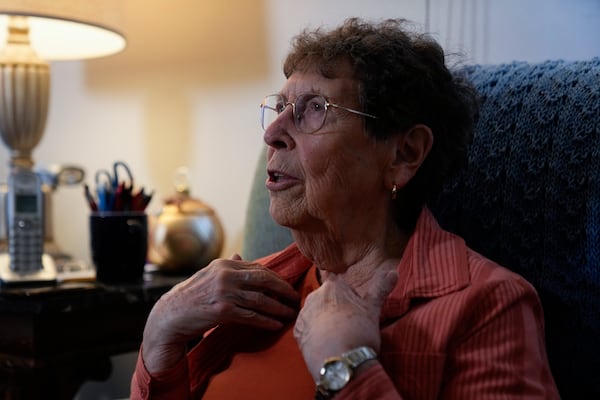 Sister JoAnn Persch, 90, a nun with the Sisters of Mercy, talks about her time helping immigrant families and asylum seekers Thursday, Feb. 20, 2025, in Alsip, Ill. (AP Photo/Erin Hooley)