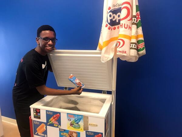 Beau Shell has been selling ice cream since he was 8 years old. Now aged 14, the owner of Lil’ Ice Cream Dude is planning to open a brick-and-mortar shop in east Athens. Here, Shell stands with his first ice cream cart, one he named Firecracker. LIGAYA FIGUERAS / LFIGUERAS@AJC.COM