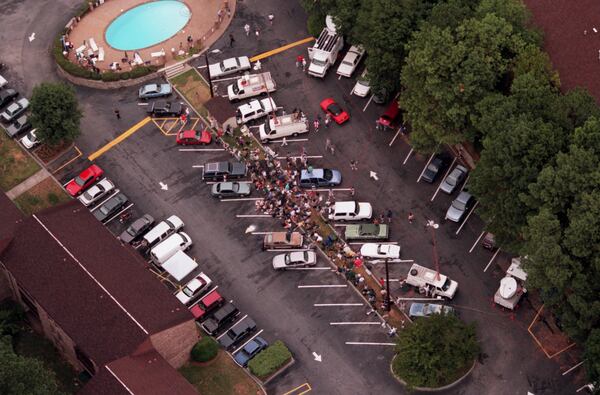 Local and national media swarmed Richard Jewell’s Buford Highway apartment after he became a suspect in the Centennial Olympic Park bombing in 1996. Jewell was later cleared of any involvement and was credited with saving lives before the explosion. COX STAFF PHOTO / DAVID CRUZ