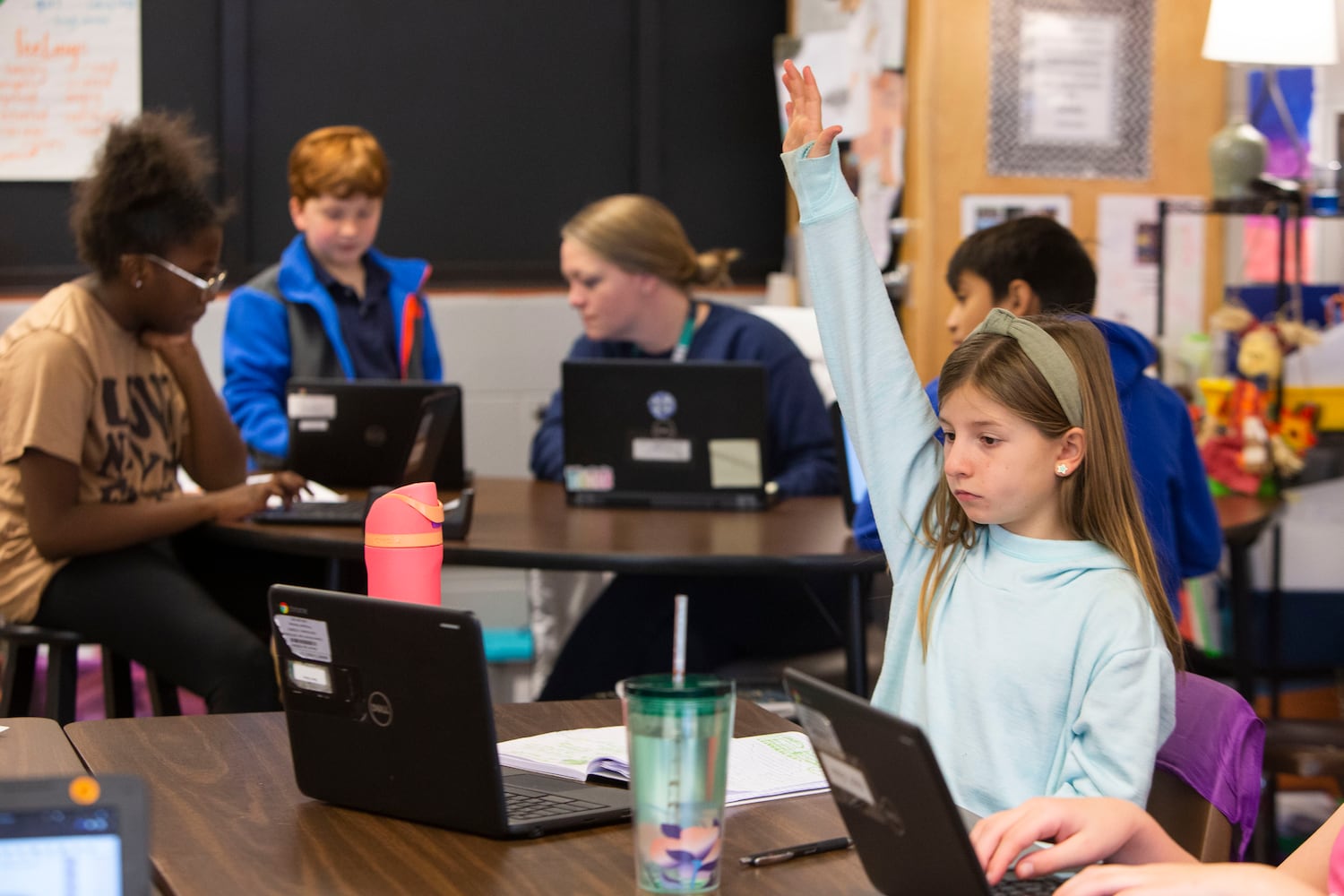 Penny Davis raises her hand during class on Wednesday, November 16, 2022, at Hickory Hills Elementary School in Marietta, Georgia. Marietta City Schools, like schools across the country, are working to overcome learning loss caused by the pandemic. CHRISTINA MATACOTTA FOR THE ATLANTA JOURNAL-CONSTITUTION