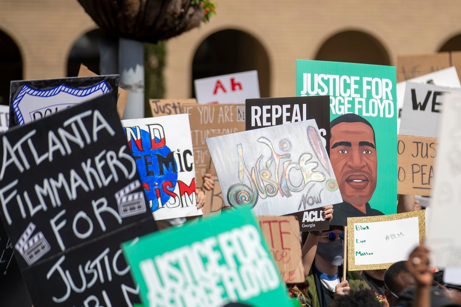 PHOTOS: Thousands march at Georgia Capitol as lawmakers return