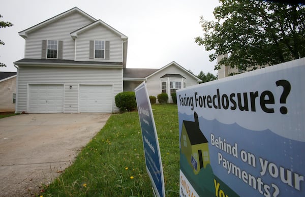 A foreclosed home for sale in DeKalb County. BOB ANDRES/ROBERT.ANDRES@AJC.COM