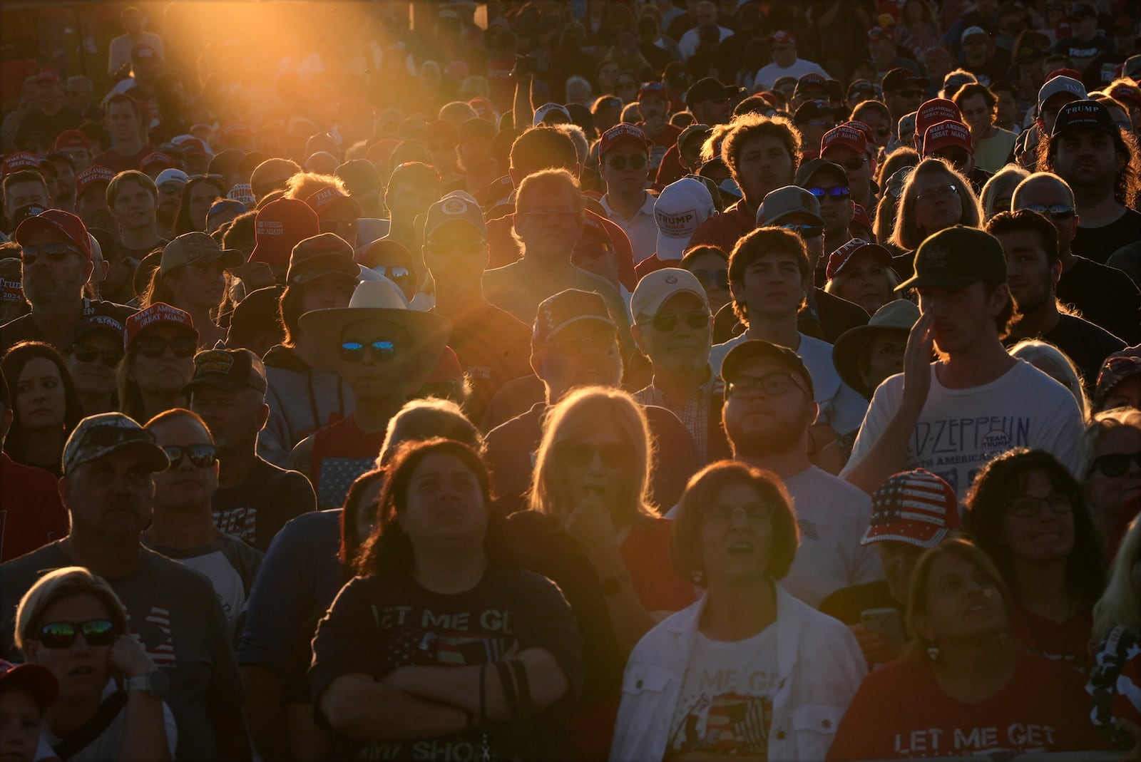 FILE - Supporters listen as Republican presidential nominee former President Donald Trump speaks during a campaign rally at the Butler Farm Show, Saturday, Oct. 5, 2024, in Butler, Pa. (AP Photo/Julia Demaree Nikhinson, File)