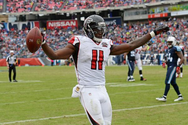 Atlanta Falcons wide receiver Julio Jones (11) celebrates after scoring a touchdown against the Tennessee Titans in the second half of an NFL football game Sunday, Oct. 25, 2015, in Nashville, Tenn. The Falcons won 10-7. (AP Photo/Mark Zaleski)