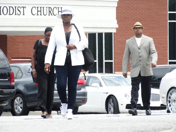 Leolah Brown, Bobby Brown’s sister, walked out during Pat Houston’s speech at Bobbi Kristina’s funeral, talked to the press, then returned. CREDIT: Rodney Ho/rho@ajc.com