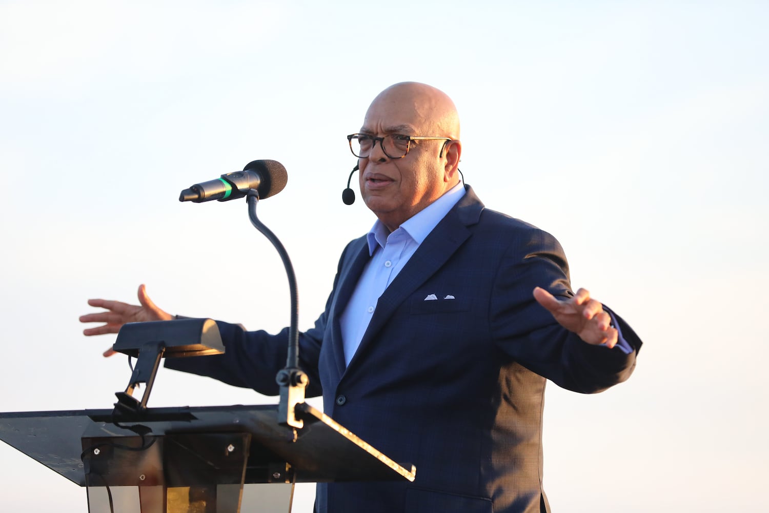 Pastor Crawford Loritts delivers the message at the top of Stone Mountain during the 76th annual Easter Sunrise Service on Sunday, April 17, 2022. The popular event returned to the park after a two-year hiatus because of the pandemic. Miguel Martinez/miguel.martinezjimenez@ajc.com