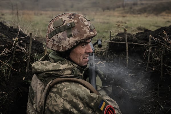 In this photo provided by Ukraine's 24th Mechanised Brigade press service, a serviceman of the 24th Mechanised Brigade improves his tactical skills at the training field in Donetsk region, Ukraine, Friday, Nov. 29, 2024. (Oleg Petrasiuk/Ukrainian 24th Mechanised Brigade via AP)