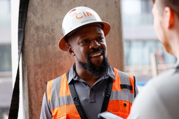 Terrence Wilson, CIM Group’s superintendent of concrete structure management, speaks to an AJC reporter as the company celebrates a milestone reaching the highest point of the Phoenix Hotel on Wednesday, December 18, 2024. The boutique hotel is part of six buildings constructed at Centennial Yards in downtown Atlanta.
(Miguel Martinez / AJC)