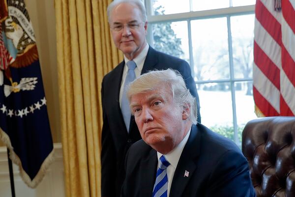 President Donald Trump with then-Health and Human Services Secretary Tom Price at the Oval Office of the White House in 2017. AP file/Pablo Martinez Monsivais