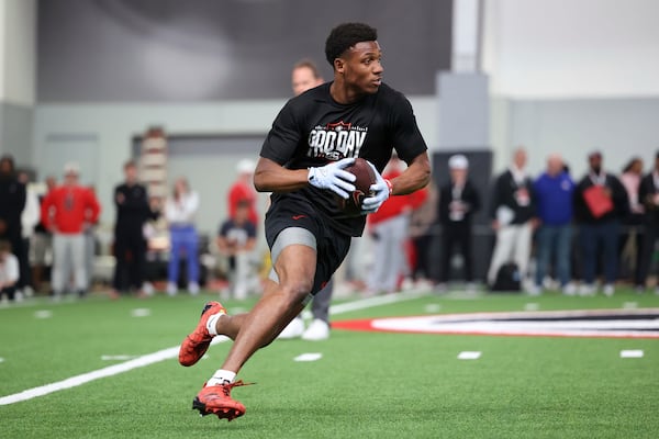 Georgia's Arian Smith runs a drill during the school's NFL Pro Day, Wednesday, March, 12, 2025, in Athens, Ga. (AP Photo/Colin Hubbard)