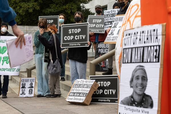 Demonstrators protest the construction of a new public safety training center during a press conference at City Hall in Atlanta on Tuesday, Jan. 31, 2023. (Arvin Temkar / arvin.temkar@ajc.com)