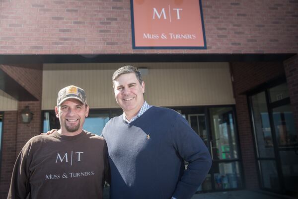 Chef Todd Mussman and partner Ryan Turner are shown at Muss & Turner’s East Cobb. There’s still a Muss & Turner’s in Smyrna, too. CONTRIBUTED BY CRYSTAL JAMES PHOTOGRAPHY