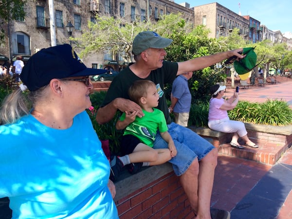 Kenneth Stanford, right, his grandson Anderson Stanford and sister, Kay Stanford, watch ships pass along the Savannah River from River Street in Savannah on Thursday, May 11, 2017. J. Scott Trubey/strubey@ajc.com