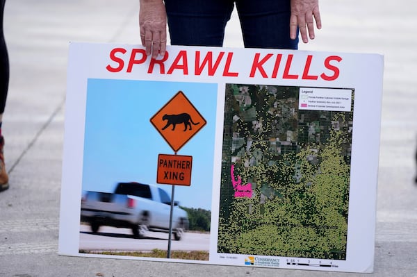 A placard displays locations of panther habitats inside the Florida Panther National Wildlife Refuge in Southwest Florida, Wednesday, Jan. 15, 2025. (AP Photo/Lynne Sladky)