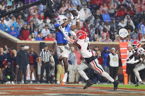 Mississippi wide receiver Antwane Wells Jr. (3) catches the ball and scores a touchdown during the second half of an NCAA college football game against Georgia on Saturday, Nov. 9, 2024, in Oxford, Miss. Mississippi won 28-10. (AP Photo/Randy J. Williams)