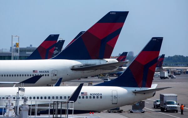 NEW YORK - JULY 22: Delta Air Lines planes sit at Terminal 4 at John F. Kennedy Airport July 22, 2014 in New York City. The Federal Aviation Administration (FAA) has halted all flights from the U.S. to Tel Aviv, Israel following a rocket attack near Ben Gurion International Airport. (Photo by Eric Thayer/Getty Images)