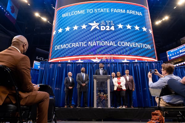 State Farm Arena's massive jumbotron was lowered to the ground as screens across the arena were plastered with a logo for the 2024 convention Thursday. Ben Gray for the Atlanta Journal-Constitution