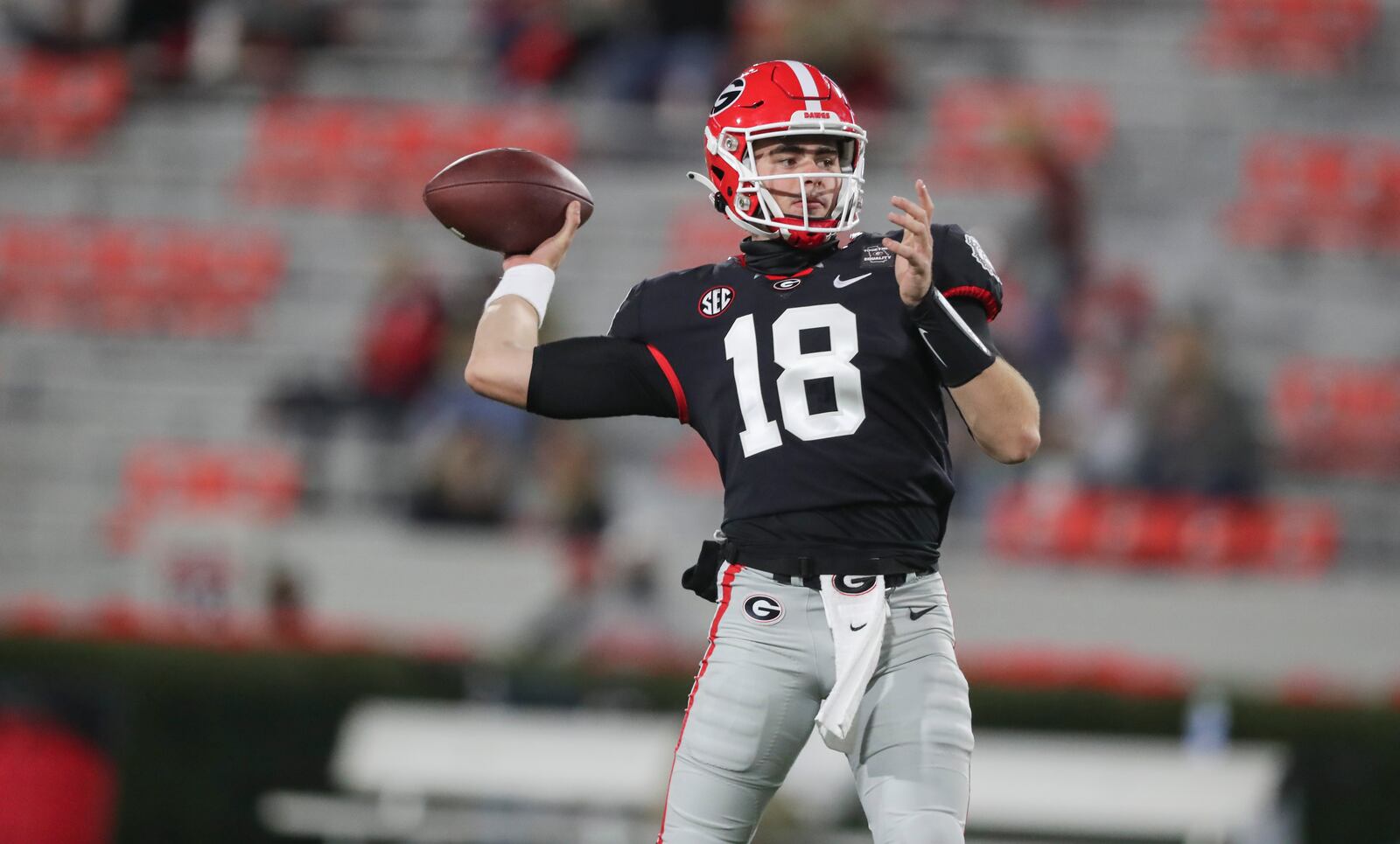 Georgia Bulldogs quarterback JT Daniels (18) warms up before an NCCA football game on Saturday, Nov. 21, 2020 at Sanford Stadium in Athens.    (Curtis Compton / Curtis.Compton@ajc.com)  