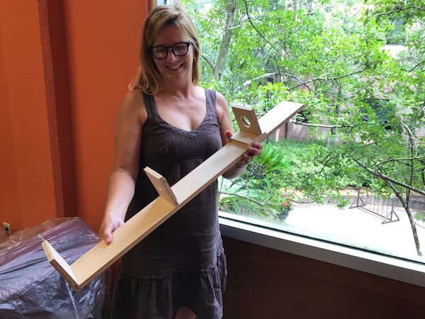 College of Charleston astronomer Laura Penny demonstrates the Safe Solar Viewer, which uses two lenses and an inexpensive frame to project an image of the eclipse onto a cardboard target. The college will host 17 eclipse-watching events around the city. BO EMERSON / BEMERSON@AJC.COM