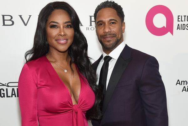 WEST HOLLYWOOD, CA - MARCH 04:  (L-R) Kenya Moore and Marc Daly attend the 26th annual Elton John AIDS Foundation's Academy Awards Viewing Party at The City of West Hollywood Park on March 4, 2018 in West Hollywood, California.  (Photo by Jamie McCarthy/Getty Images for EJAF)