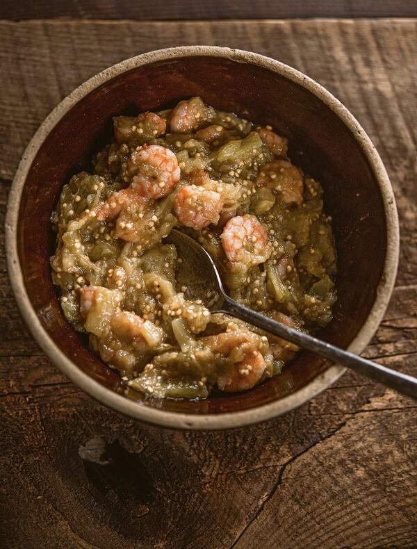 Smothered Eggplant and Shrimp, excerpted from “Mosquito Supper Club” by Melissa Martin (Artisan Books, $35), deliciously melds two Cajun staples into one rustic, satisfying supper. CONTRIBUTED BY DENNY CULBERT