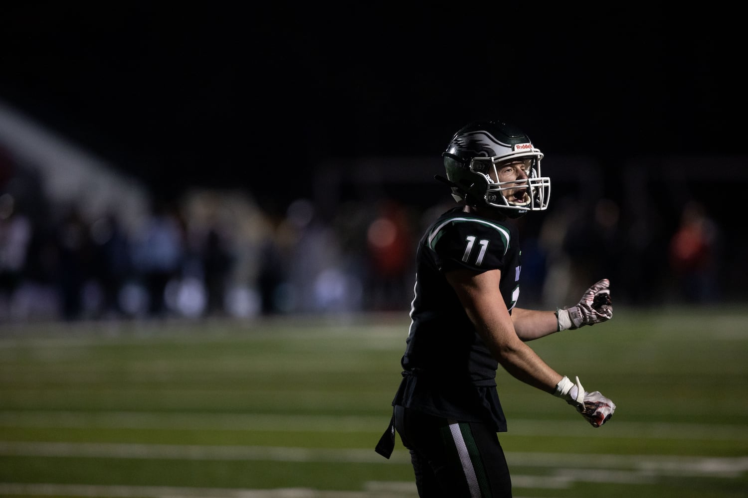 Collins Hill's Coby Rogers (11) celebrates during a GHSA high school football game between the Collins Hill Eagles and the Grayson Rams at Collins Hill High in Suwanee, GA., on Friday, December 3, 2021. (Photo/ Jenn Finch)