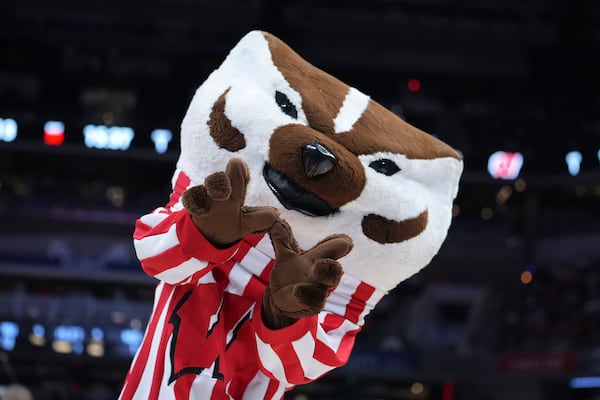 Wisconsin mascot Bucky Badger performs during the first half of an NCAA college basketball game against Michigan State in the semifinals of the Big Ten Conference tournament in Indianapolis, Saturday, March 15, 2025. (AP Photo/Michael Conroy)