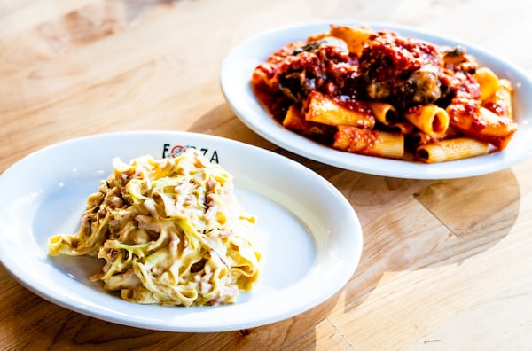 Pastas at Forza Storico include Papalina (left; creamy fettuccine tossed with fat slivers of prosciutto cotto) and Sugo di Coda (rigatoni in tomato sauce with bone-in oxtail). CONTRIBUTED BY HENRI HOLLIS