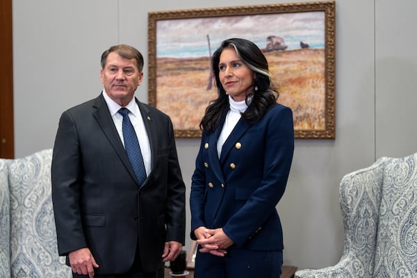 Tulsi Gabbard, President-elect Donald Trump's nominee to be director of National Intelligence, ight, meets with Sen. Mike Rounds, R-S.D., a member of the Senate Intelligence Committee, at the Capitol in Washington, Monday, Dec. 9, 2024. (AP Photo/J. Scott Applewhite)