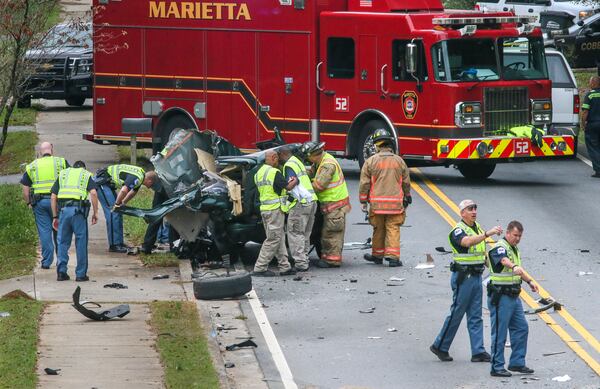 A man was killed Thursday morning, Oct. 29, 2015, in a multi-vehicle wreck on Bells Ferry Road, Cobb County police said. JOHN SPINK /JSPINK@AJC.COM