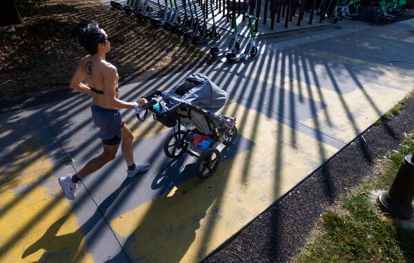 Dow Lin pushes his 14-month-old son along the Beltline's Eastside Trail on a recent morning.