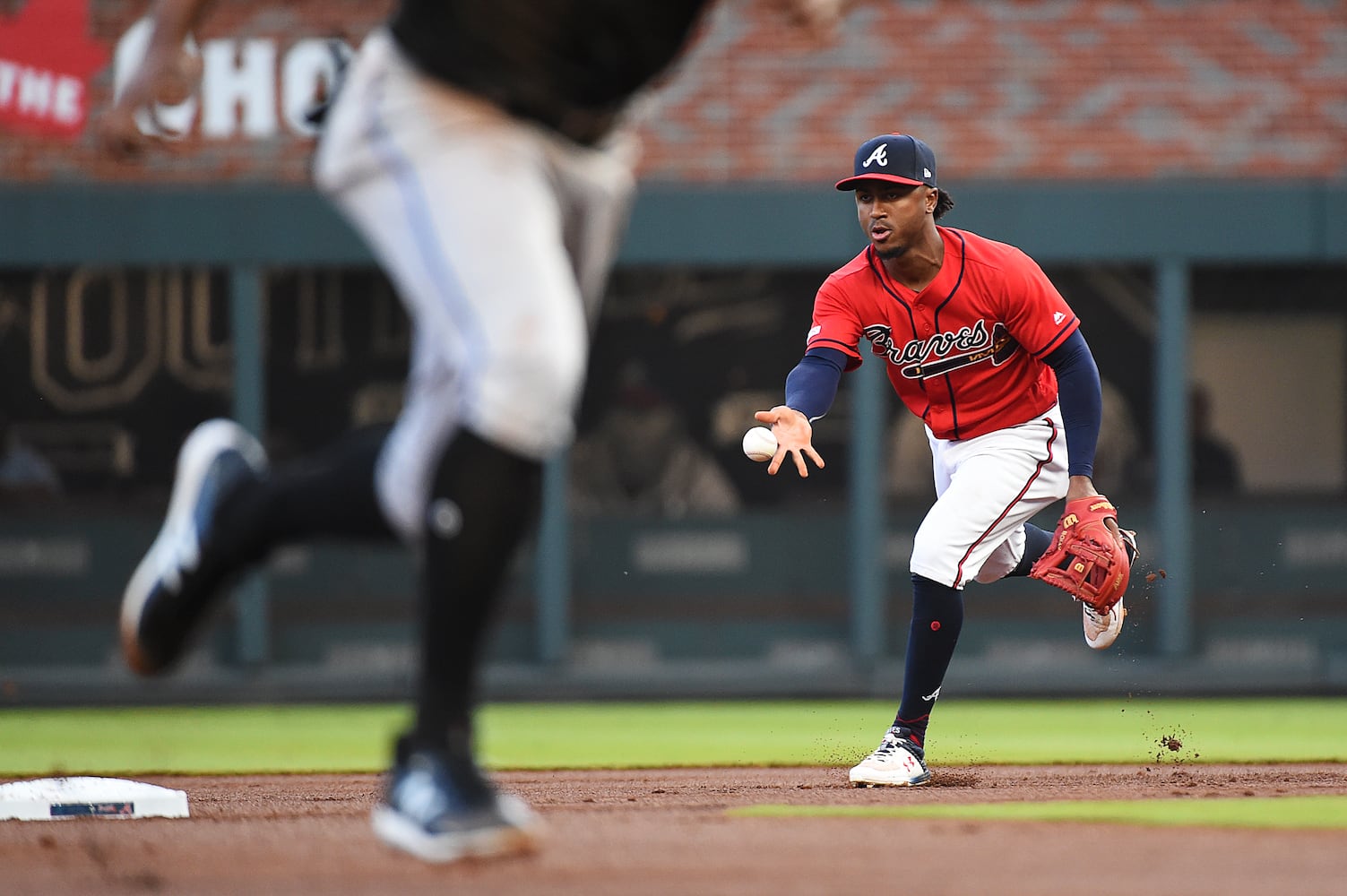 Photos: Braves break out red uniforms, host Marlins